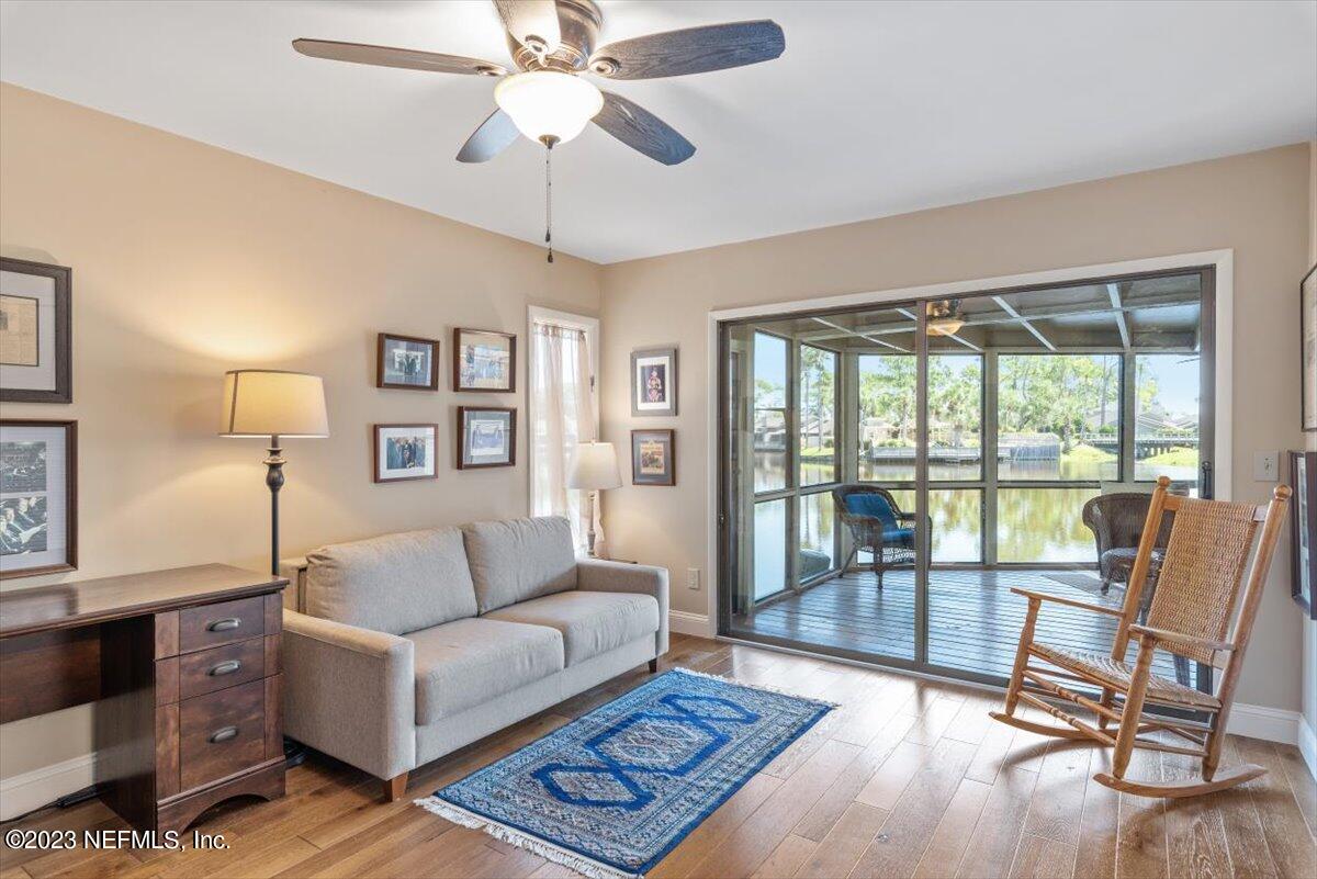 75 Fishermans Cove Road Ponte Vedra Beach, FL 32082 - Photo 25 of 47 a living room with furniture and a large window
