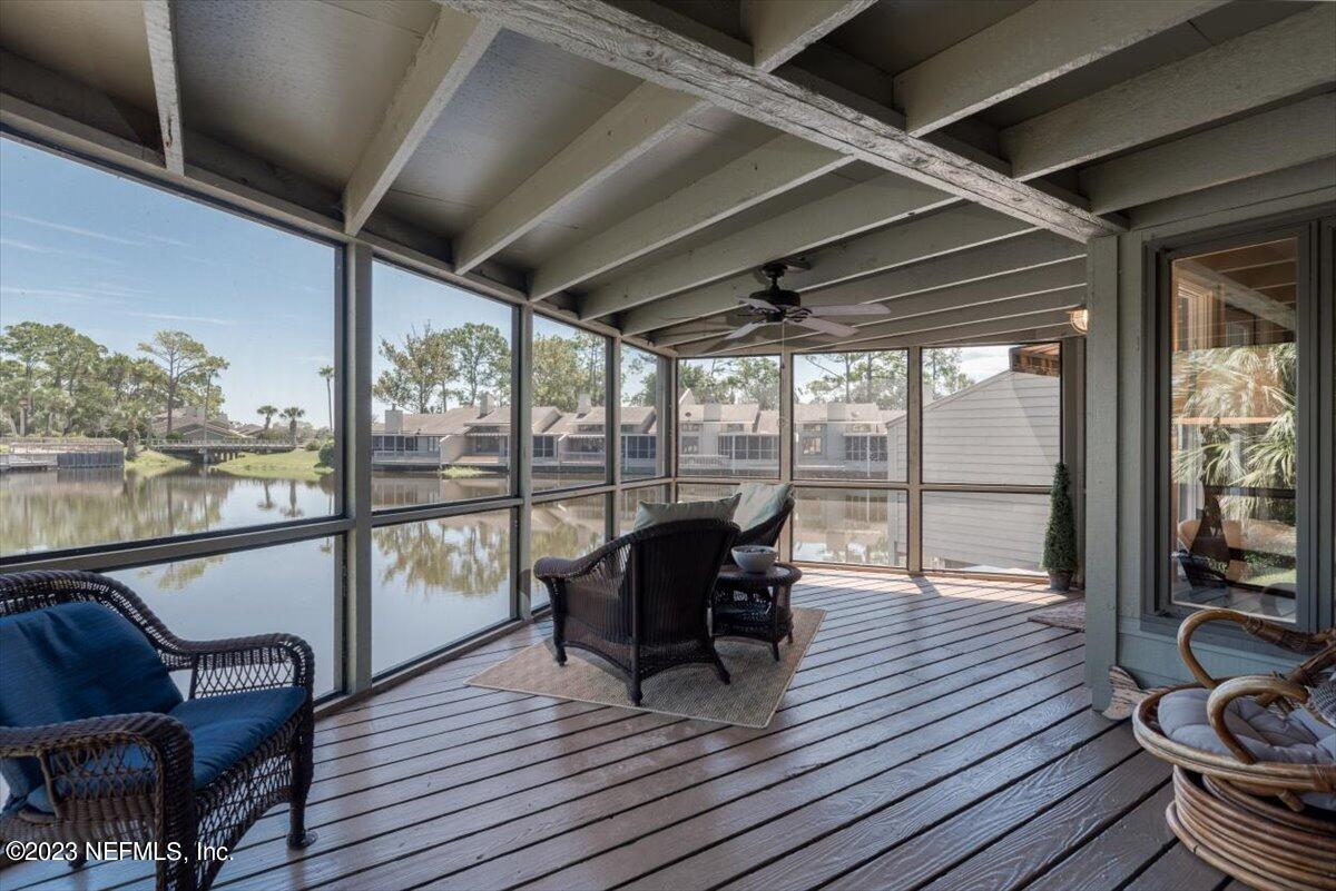 75 Fishermans Cove Road Ponte Vedra Beach, FL 32082 - Photo 31 of 47 a view of a deck with wooden floor and outdoor seating