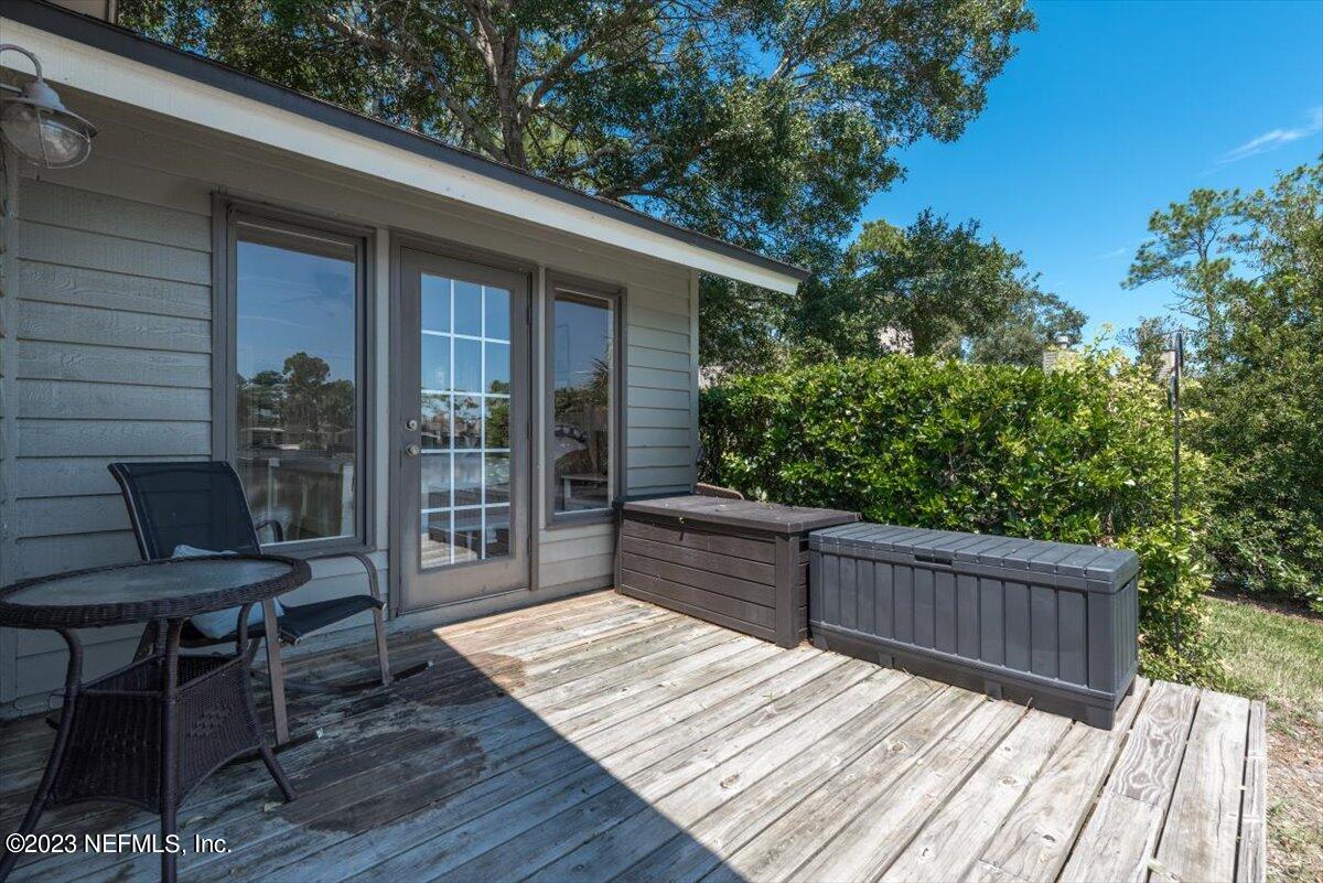 75 Fishermans Cove Road Ponte Vedra Beach, FL 32082 - Photo 35 of 47 a view of a wooden deck and a patio