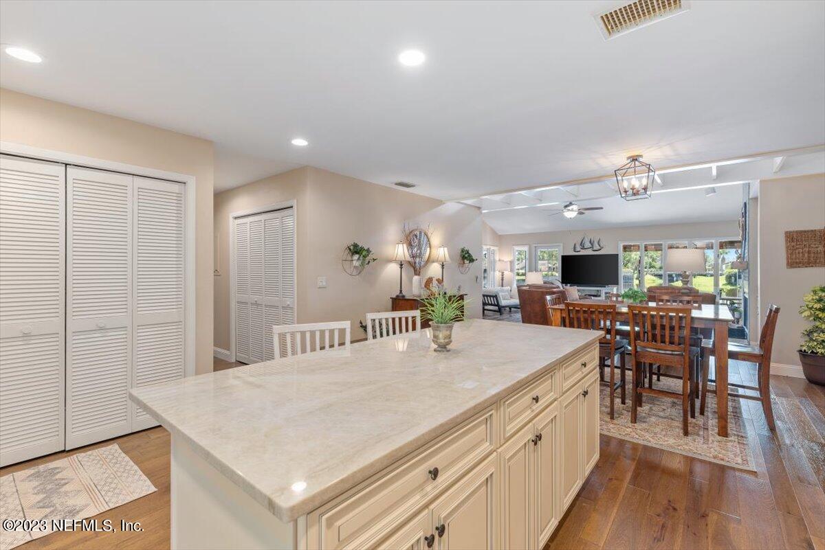 75 Fishermans Cove Road Ponte Vedra Beach, FL 32082 - Photo 8 of 47 a view of a dining area with furniture and wooden floor
