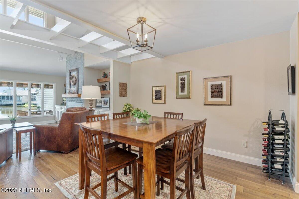 75 Fishermans Cove Road Ponte Vedra Beach, FL 32082 - Photo 9 of 47 a view of a dining room with furniture and wooden floor