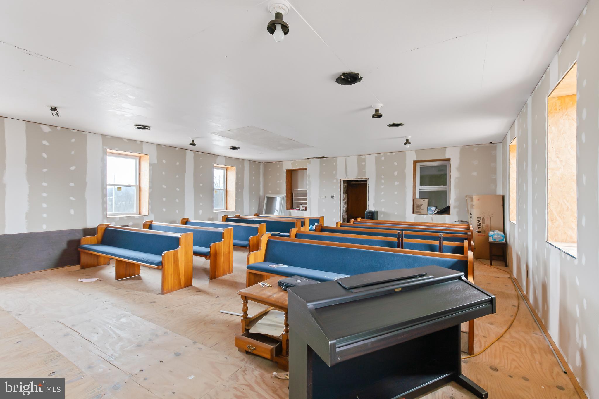 3 Martzall Road Denver, PA 17517 - Photo 8 of 16 a living room with furniture a pool table and a window