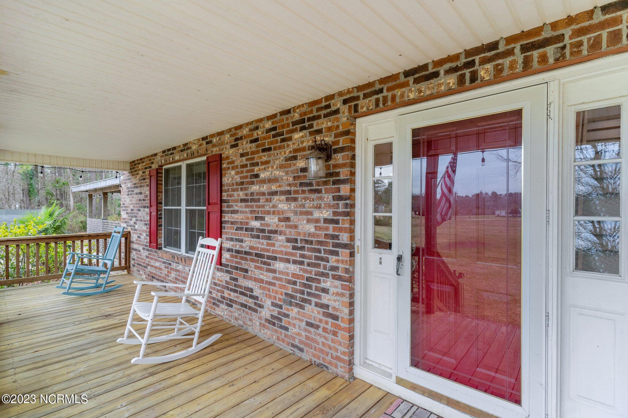 1272 Cherrytree Road Northeast Winnabow, NC 28479 - Photo 3 of 20 Rocking Chair Front Porch