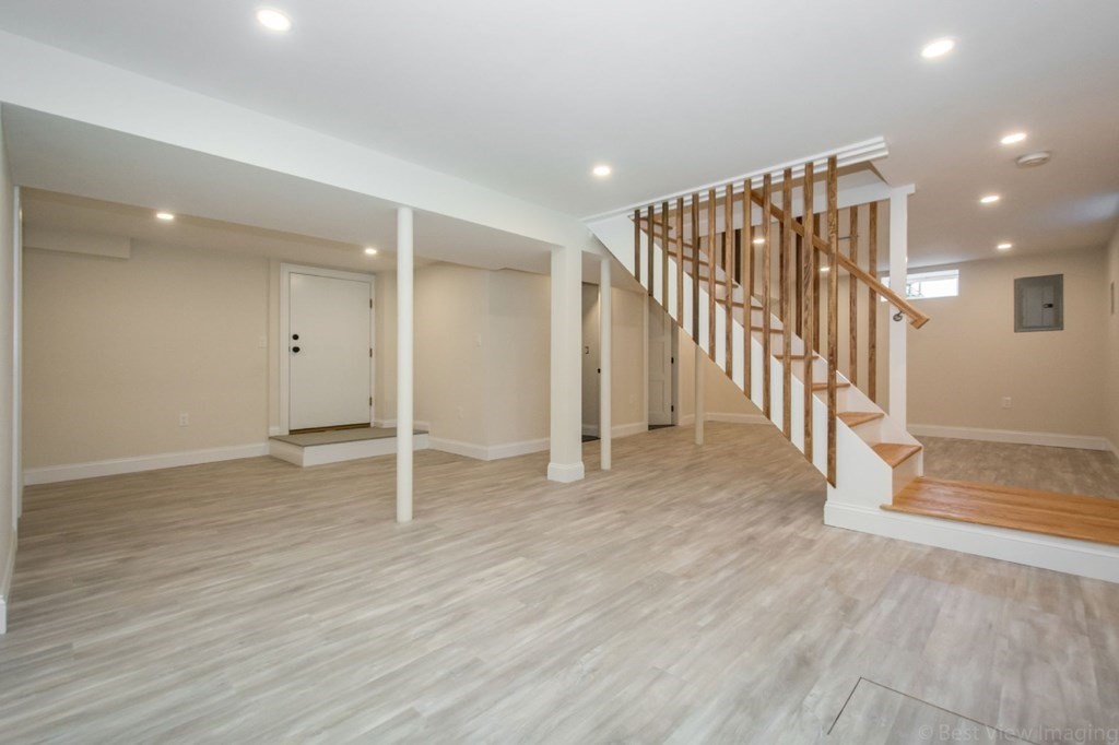 214 Riverside Drive Dedham, MA 02026 - Photo 19 of 26 a view of entryway with wooden floor