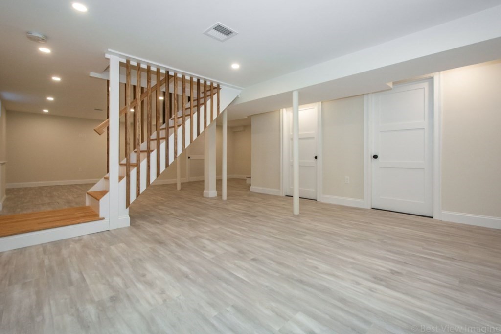 214 Riverside Drive Dedham, MA 02026 - Photo 20 of 26 a view of entryway with wooden floor