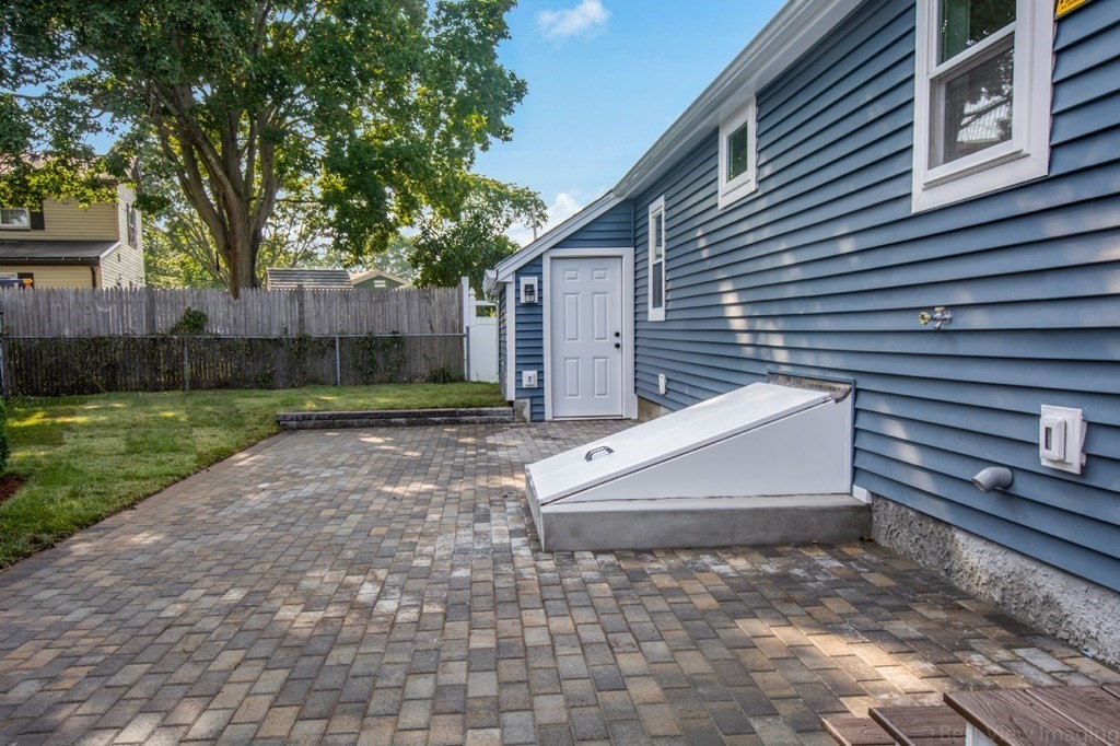 214 Riverside Drive Dedham, MA 02026 - Photo 25 of 26 a view of backyard with green space