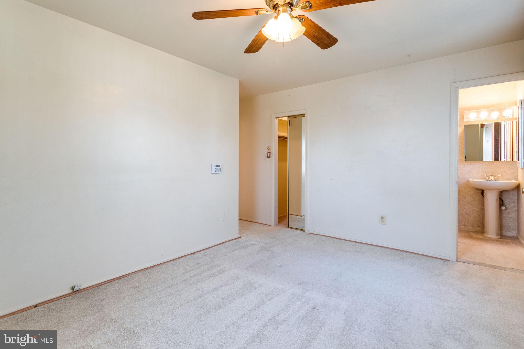 6424 Meriwether Lane Springfield, VA 22150 - Photo 15 of 39 Master bedroom w/ walk in closet & private bath