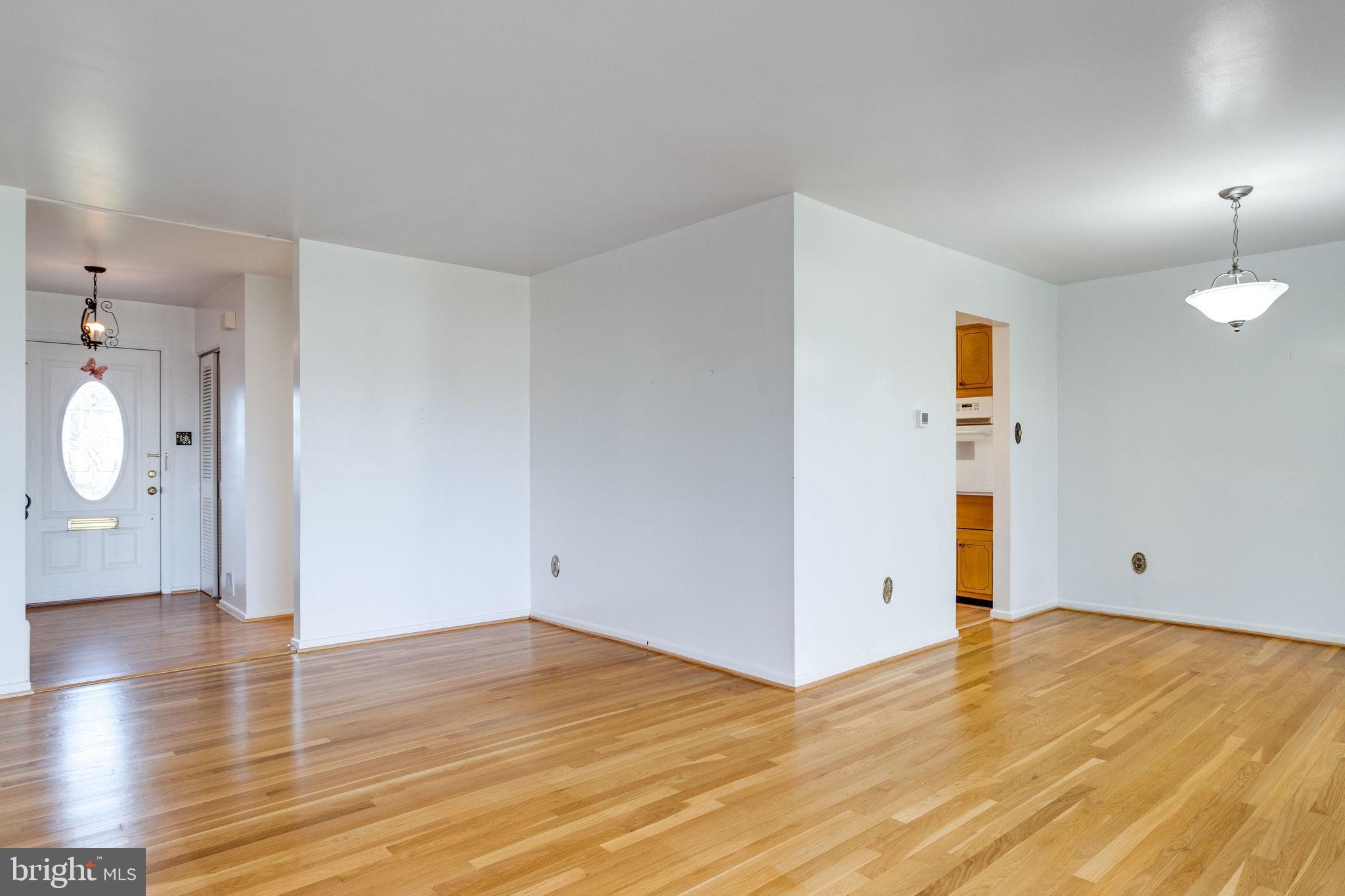 6424 Meriwether Lane Springfield, VA 22150 - Photo 5 of 39 Living Room to Dining Room opens to Kitchen