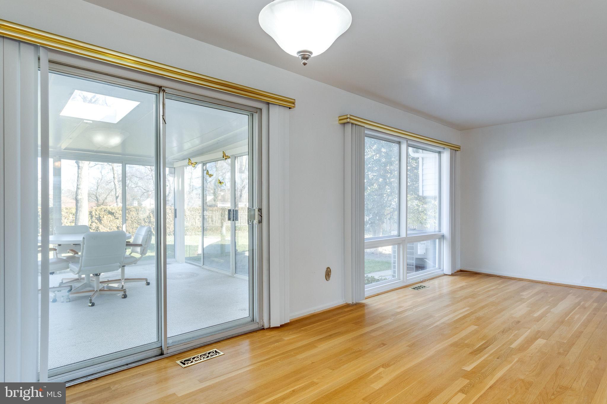 6424 Meriwether Lane Springfield, VA 22150 - Photo 8 of 39 Sliding Glass Doors lead to Sun Room
