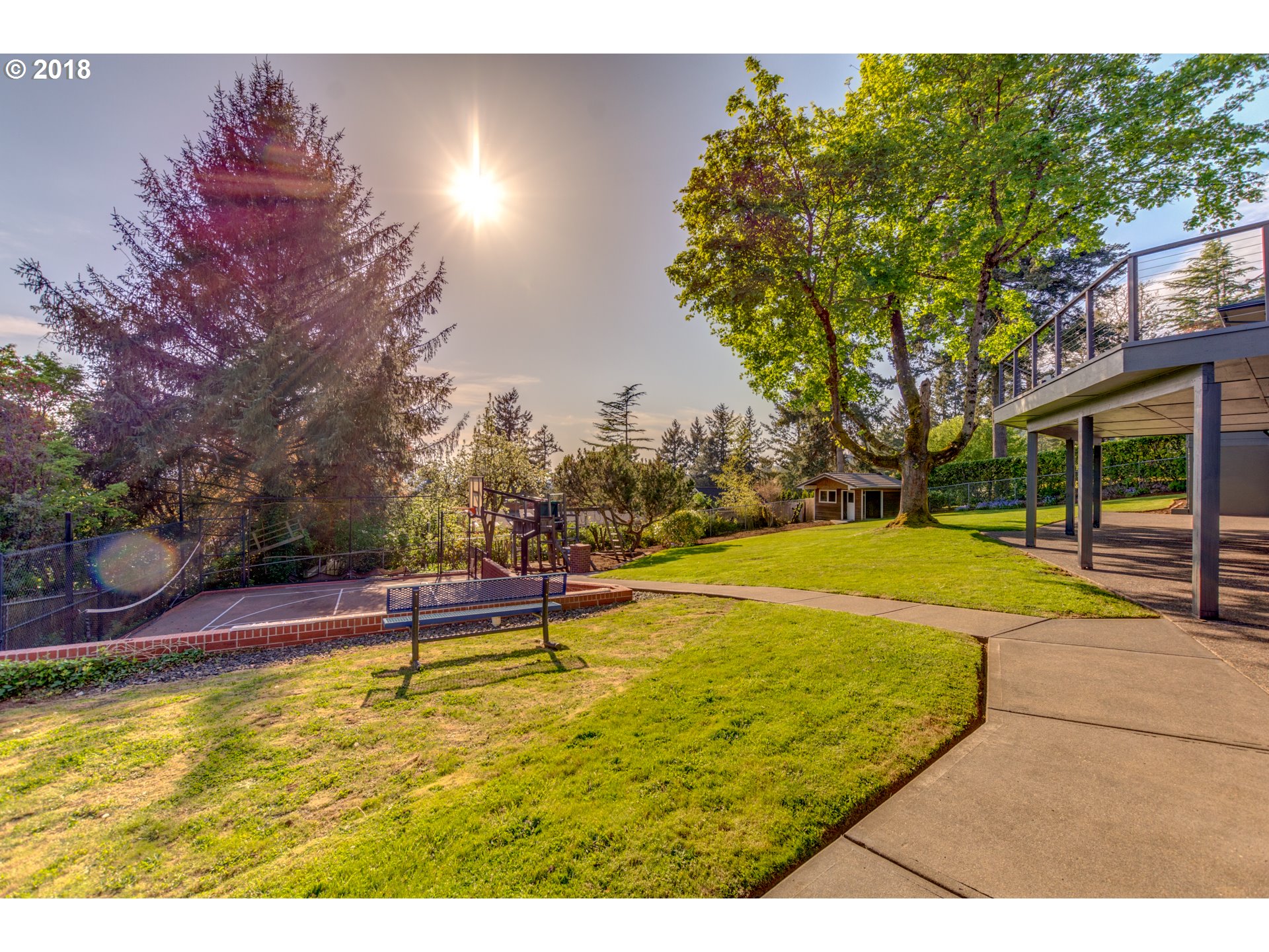 3925 Southwest Jerald Way Portland, OR 97221 - Photo 29 of 31 a swimming pool with outdoor seating and yard