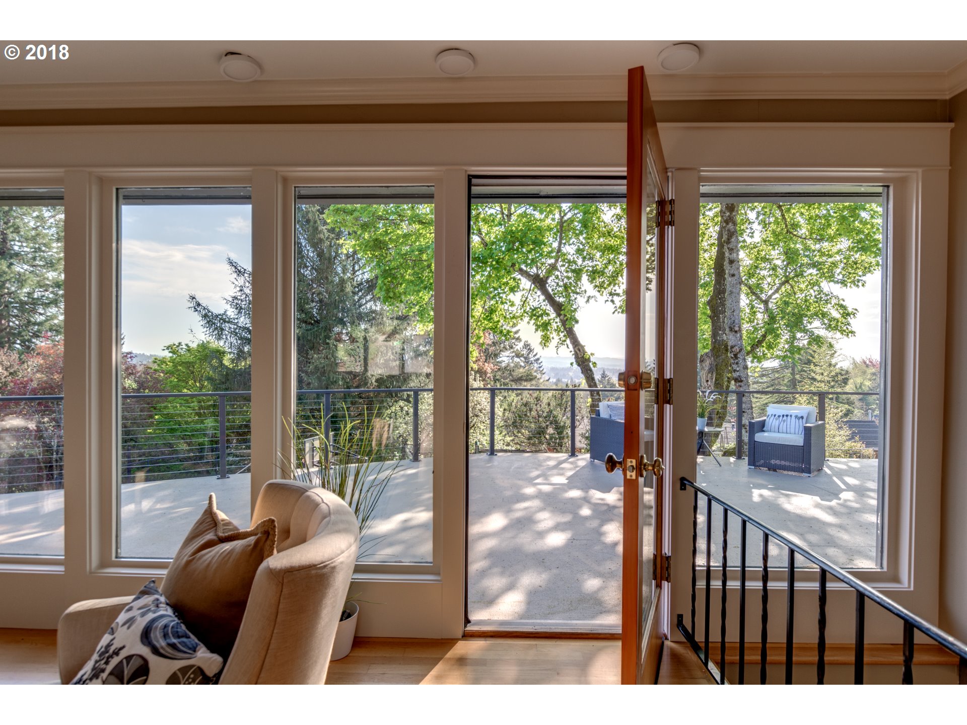 3925 Southwest Jerald Way Portland, OR 97221 - Photo 6 of 31 a living room with large windows