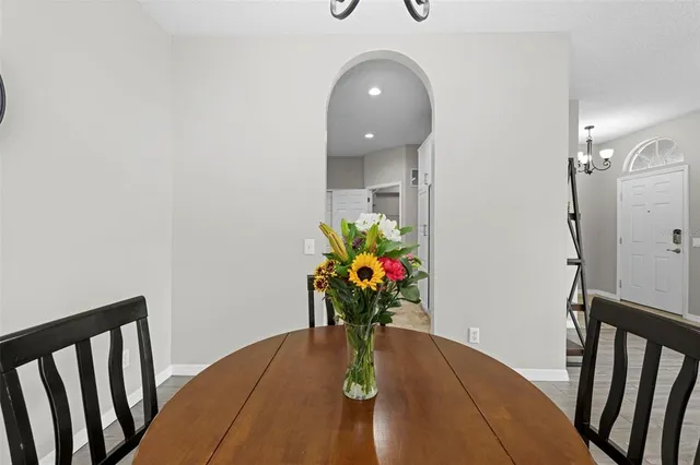 a view of living room with furniture and window