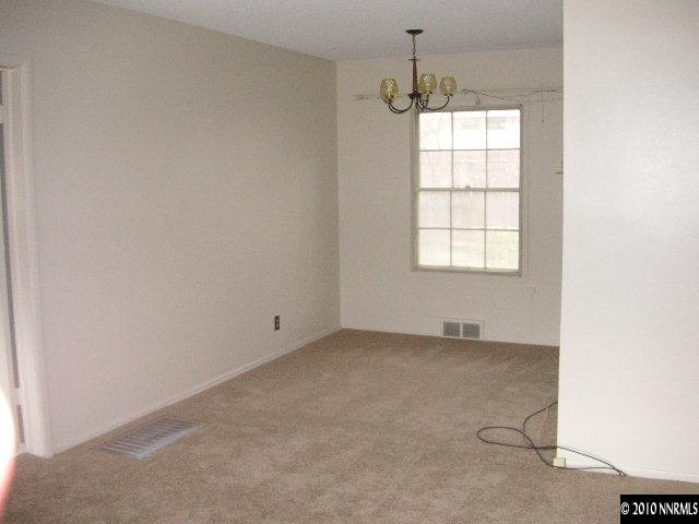 2301 Westfield Avenue Reno, NV 89509 - Photo 3 of 4 an empty room with windows