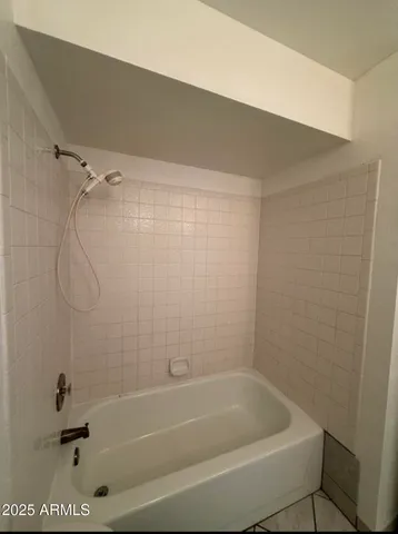 a bathroom with a bathtub