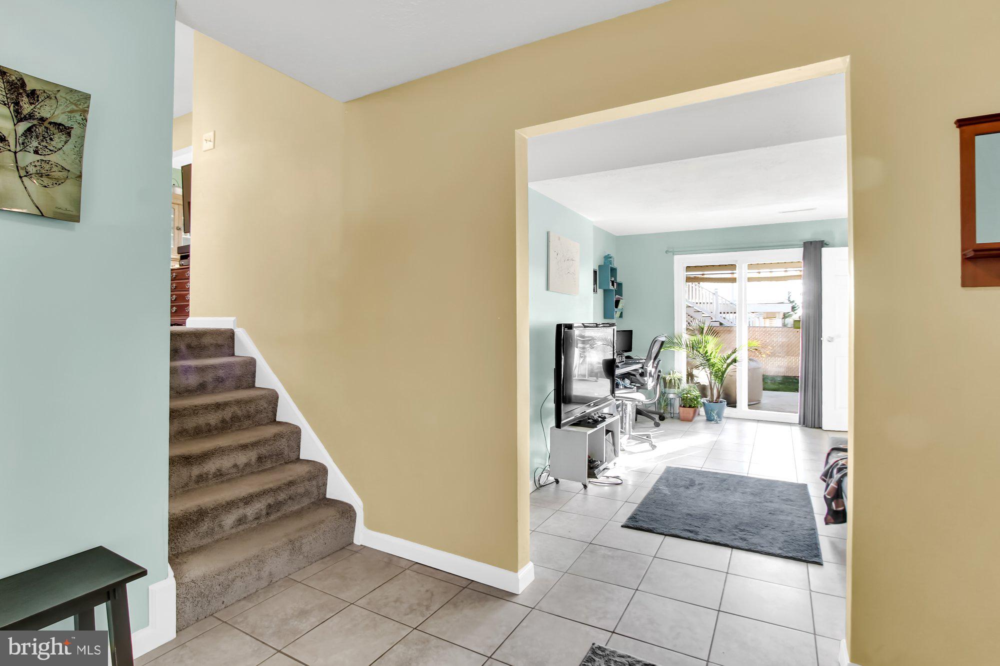 4381 Winchester Road Dover, PA 17315 - Photo 2 of 26 front door entry with view of family rm