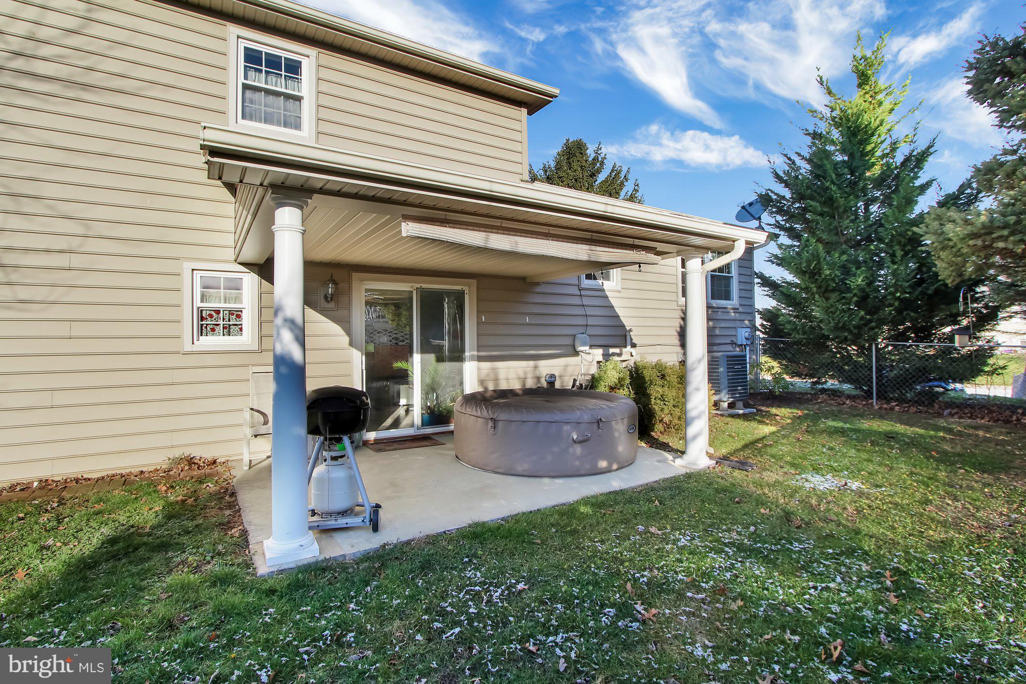 4381 Winchester Road Dover, PA 17315 - Photo 20 of 26 covered patio with fenced yard