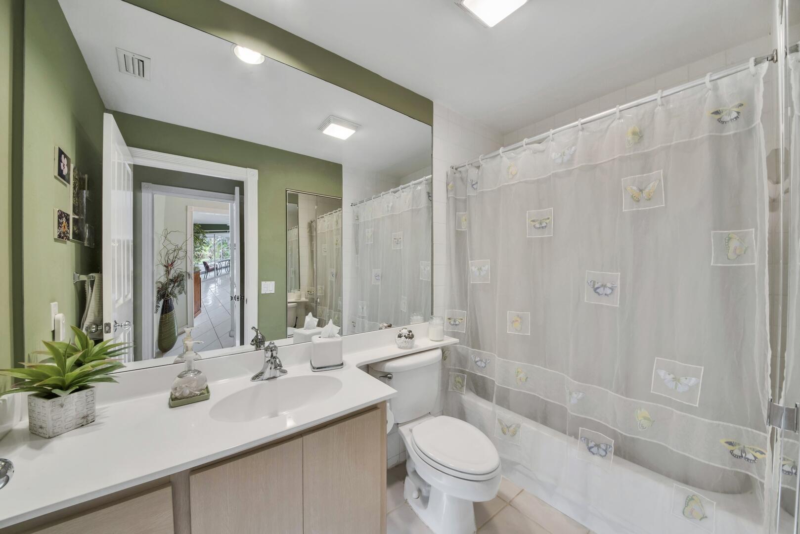 4220 Royal Oak Drive Palm Beach Gardens, FL 33410 - Photo 16 of 35 a bathroom with a sink a toilet and shower