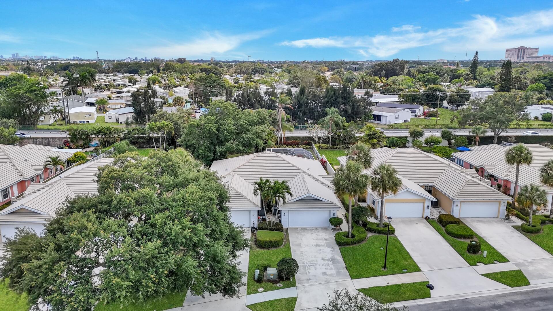 4220 Royal Oak Drive Palm Beach Gardens, FL 33410 - Photo 25 of 35 an aerial view of multiple house