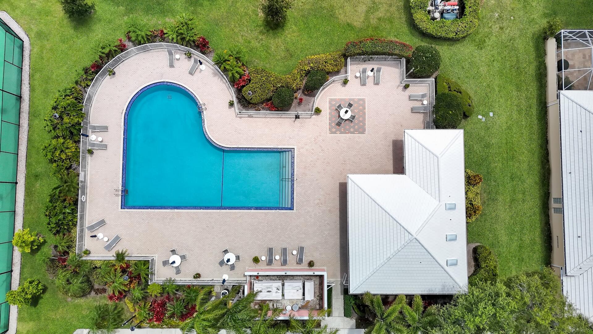 4220 Royal Oak Drive Palm Beach Gardens, FL 33410 - Photo 27 of 35 an aerial view of a house with swimming pool and outdoor space
