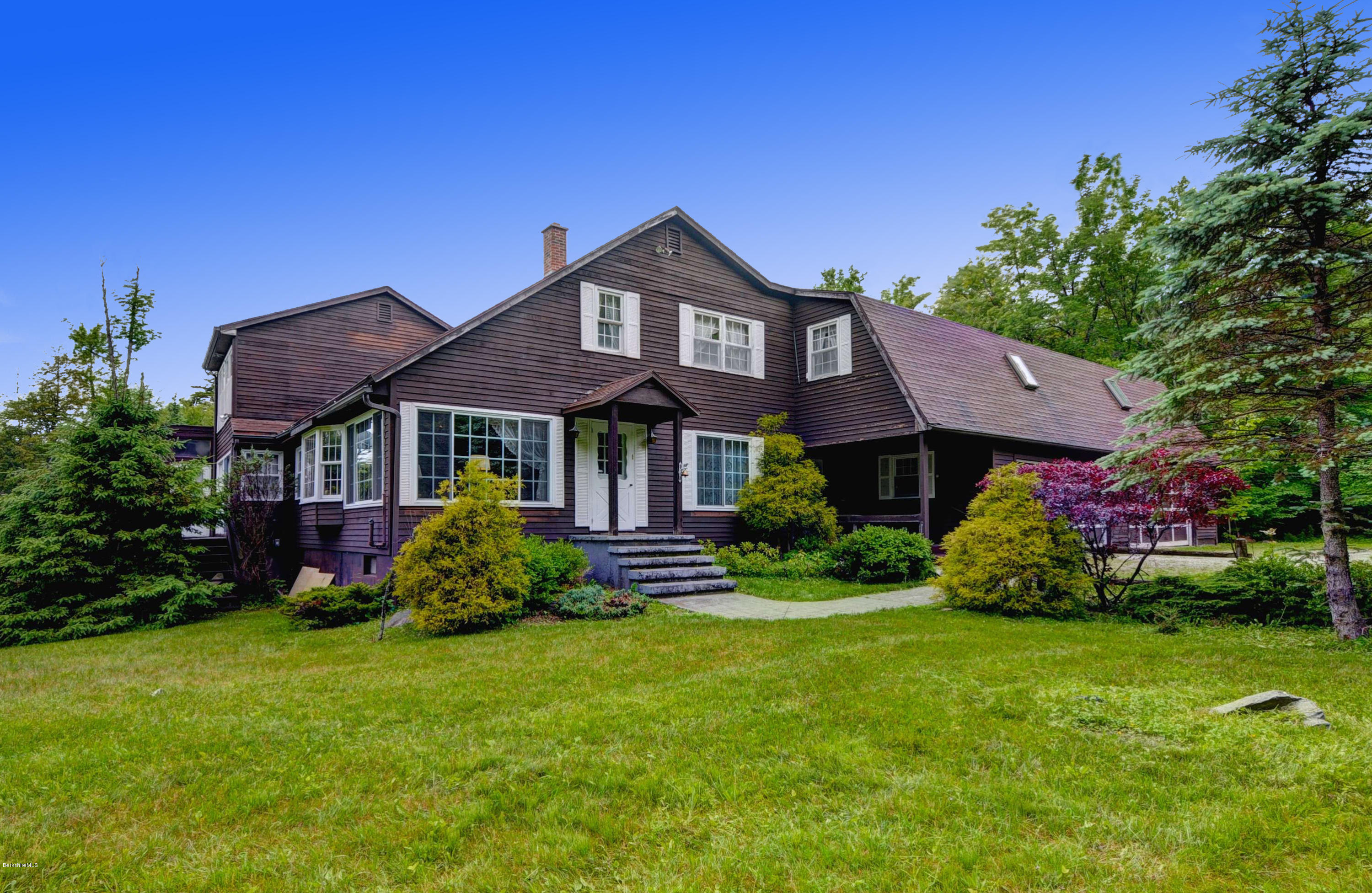 11 Andes Road Peru, MA 01235 - Photo 1 of 29 a front view of a house with garden