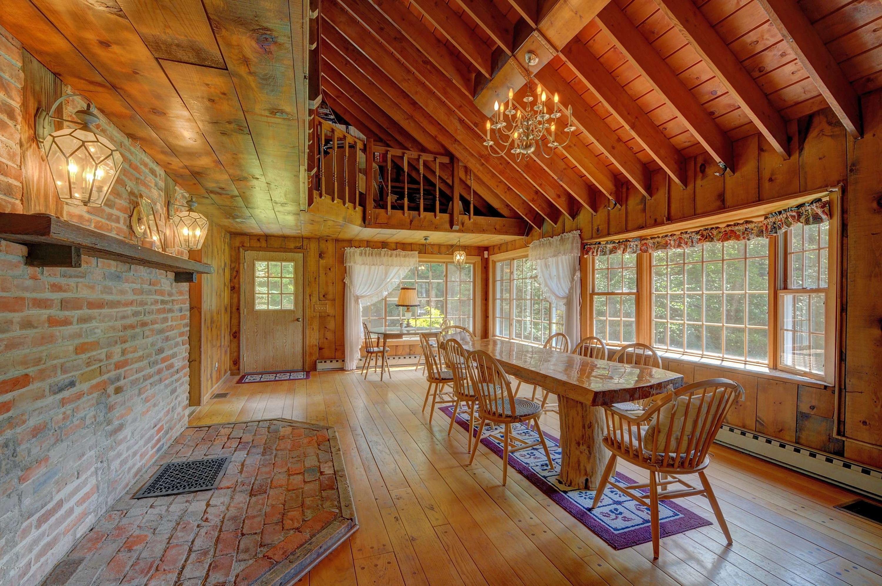 11 Andes Road Peru, MA 01235 - Photo 15 of 29 a dining room with furniture wooden floor and a rug