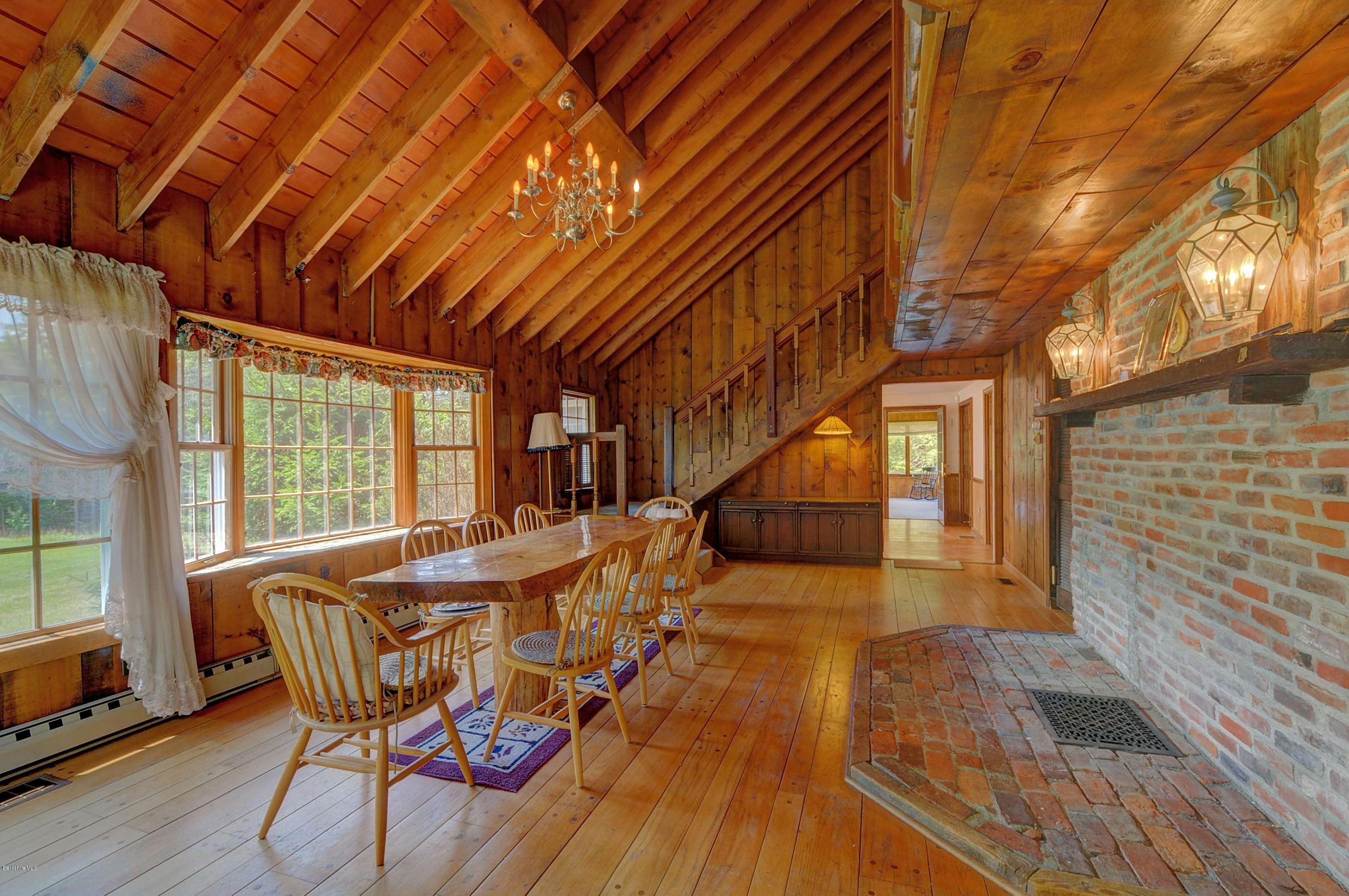11 Andes Road Peru, MA 01235 - Photo 16 of 29 a dining room with furniture wooden floor and a rug
