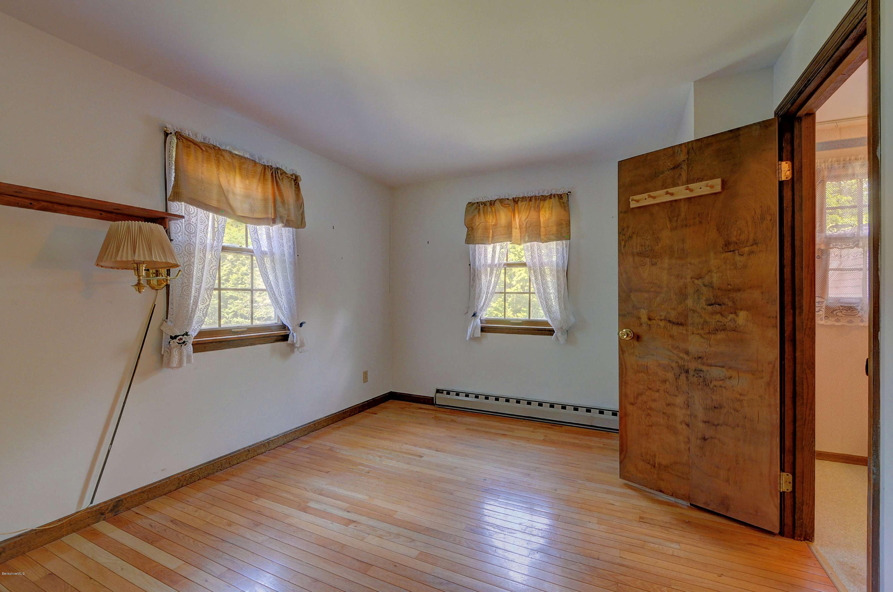 11 Andes Road Peru, MA 01235 - Photo 26 of 29 an empty room with wooden floor and windows
