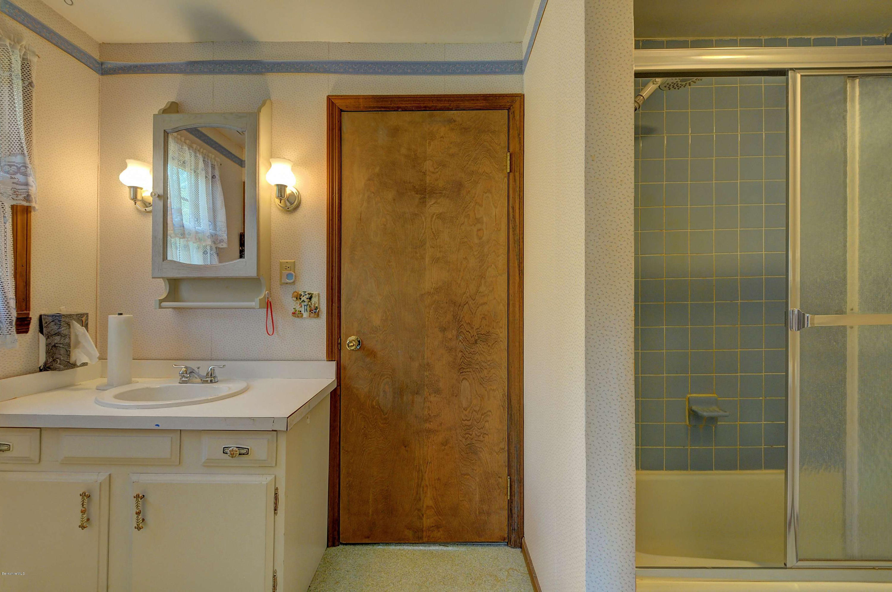 11 Andes Road Peru, MA 01235 - Photo 27 of 29 a bathroom with a sink a mirror and a shower