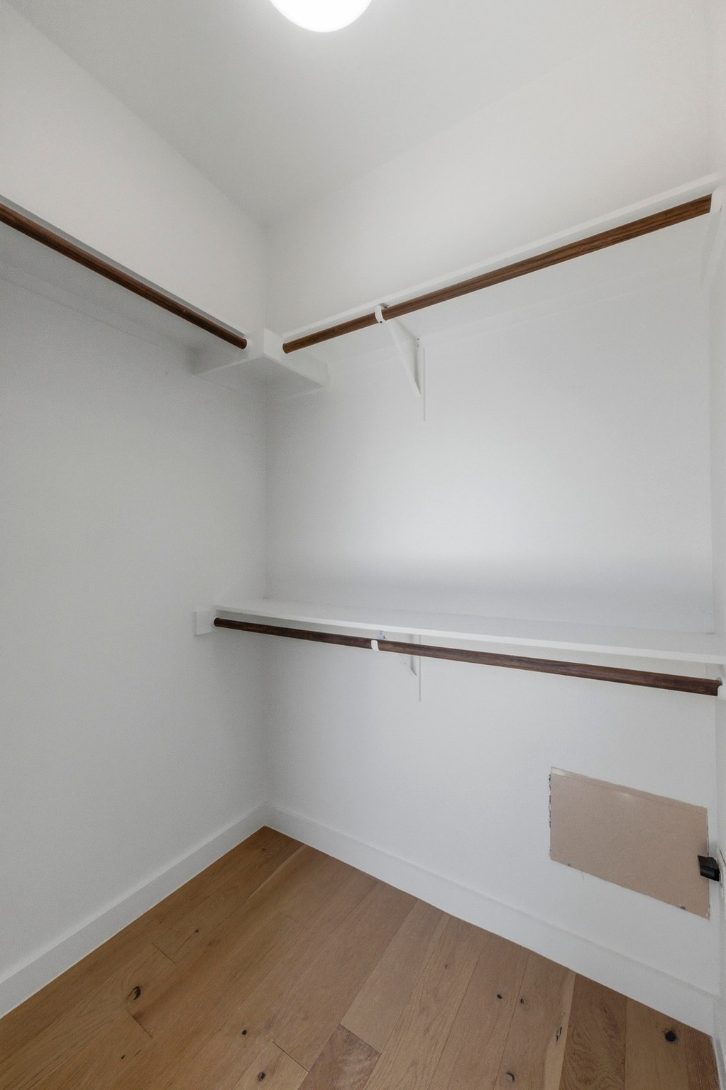 2002 East 7th Street, Unit 242 Austin, TX 78702 - Photo 18 of 34 Spacious closet featuring light wood finished floors