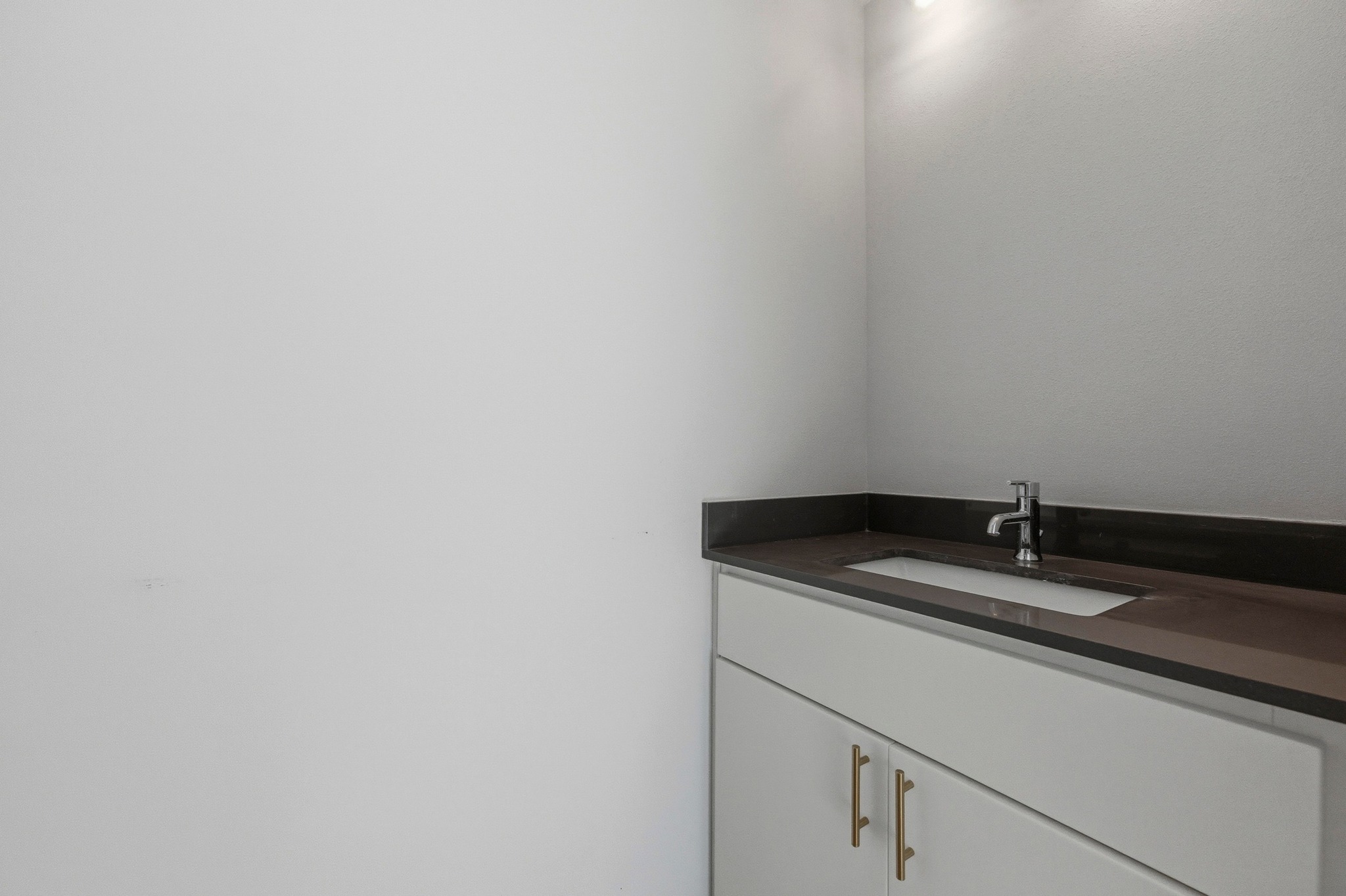 2002 East 7th Street, Unit 242 Austin, TX 78702 - Photo 27 of 34 Bathroom featuring vanity