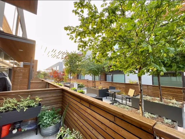 a view of a lake with a sitting area