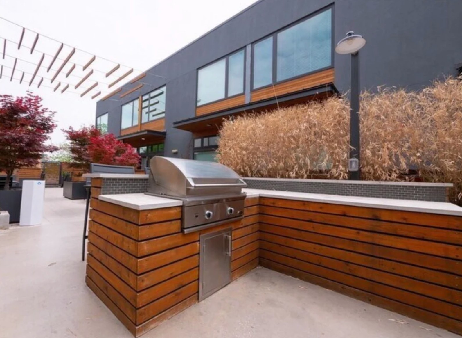 2002 East 7th Street, Unit 242 Austin, TX 78702 - Photo 33 of 34 View of patio with exterior kitchen