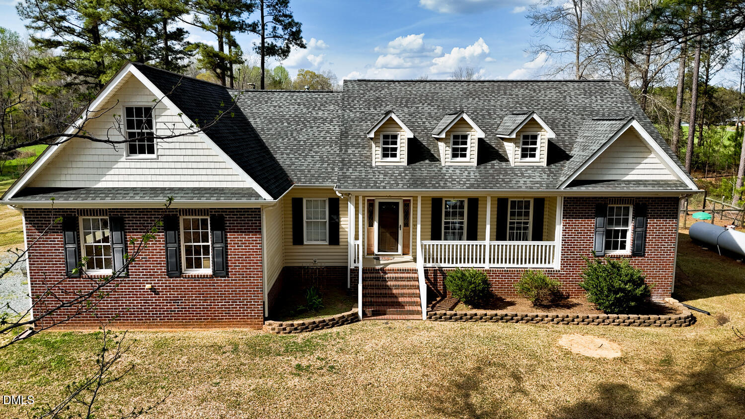 2890 Rosser Road Bear Creek, NC 27207 - Photo 1 of 6 a front view of a house with a yard