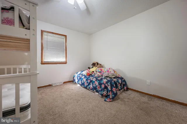 a room with toys and dresser