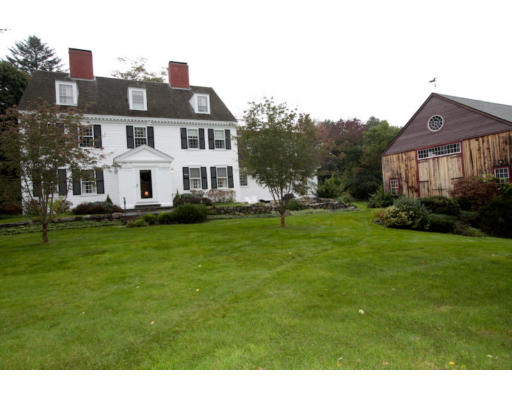 14 Sunset Rock Road Andover, MA 01810 - Photo 1 of 26 a front view of a house with garden and trees