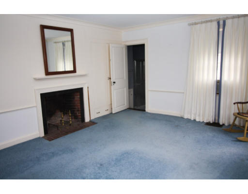 14 Sunset Rock Road Andover, MA 01810 - Photo 15 of 26 a view of an empty room with a fireplace