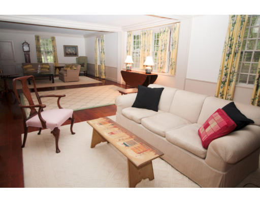 14 Sunset Rock Road Andover, MA 01810 - Photo 22 of 26 a living room with furniture and wooden floor