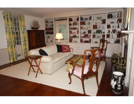 14 Sunset Rock Road Andover, MA 01810 - Photo 23 of 26 a living room with furniture and a floor to ceiling window