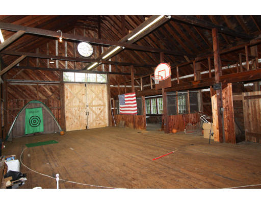 14 Sunset Rock Road Andover, MA 01810 - Photo 24 of 26 a view of a room with wooden floor