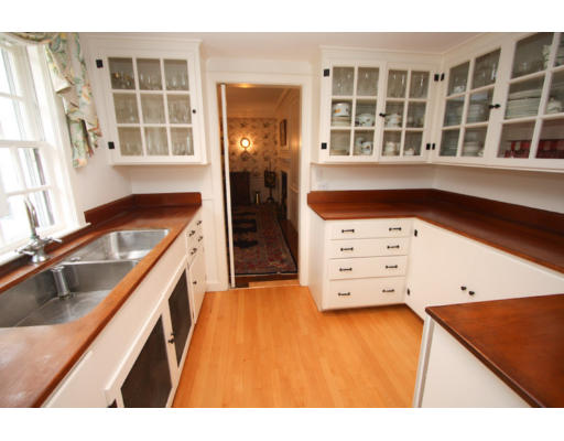 14 Sunset Rock Road Andover, MA 01810 - Photo 9 of 26 a kitchen with cabinets and window