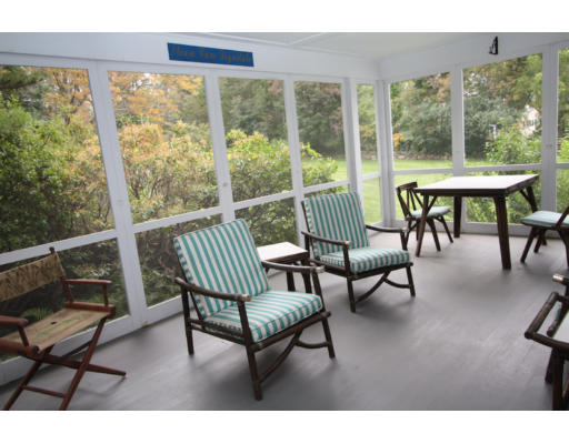14 Sunset Rock Road Andover, MA 01810 - Photo 10 of 26 a living room with furniture and a floor to ceiling window