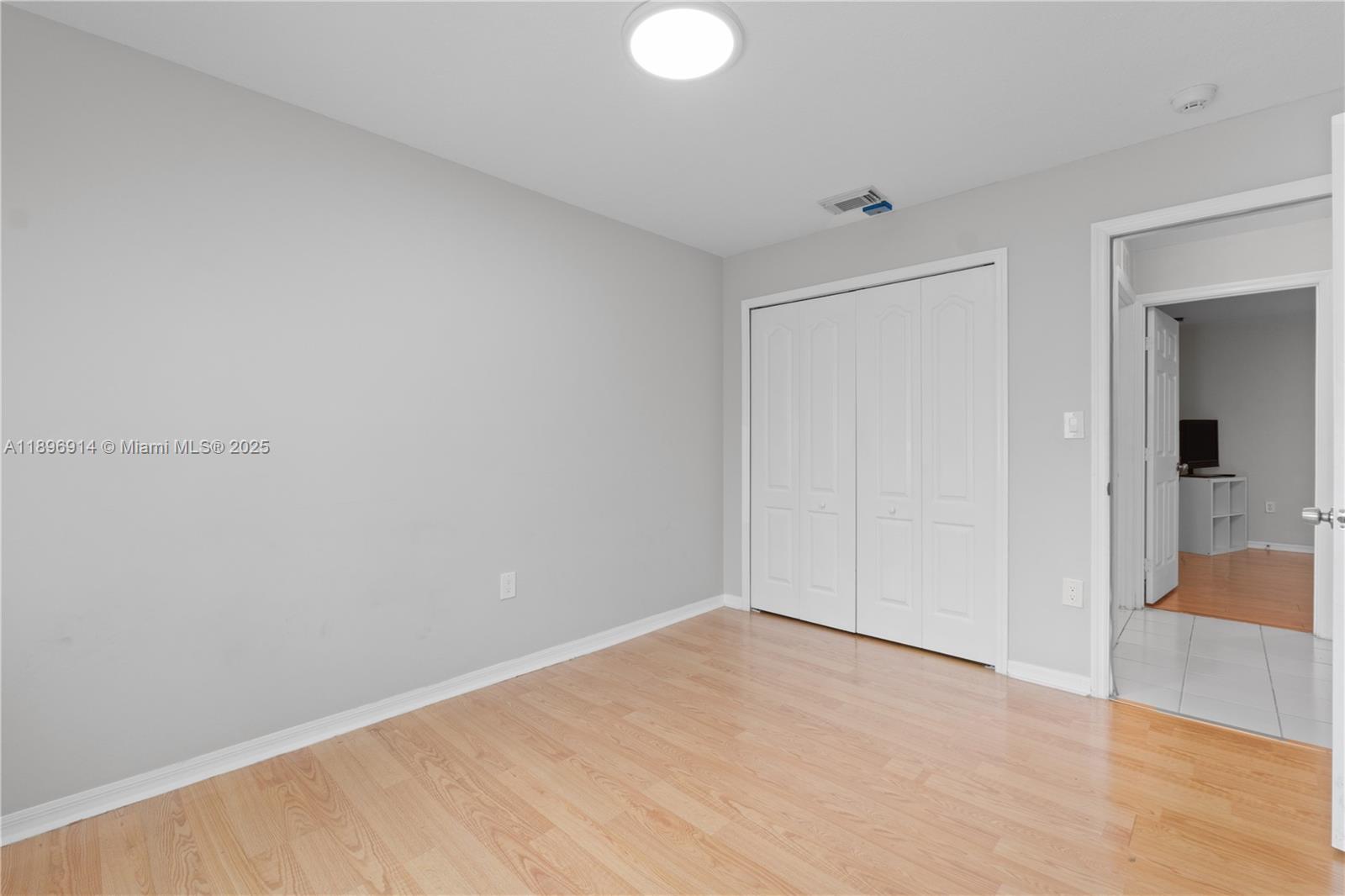 15327 Southwest 179th Terrace Miami, FL 33187 - Photo 14 of 29 a view of an empty room