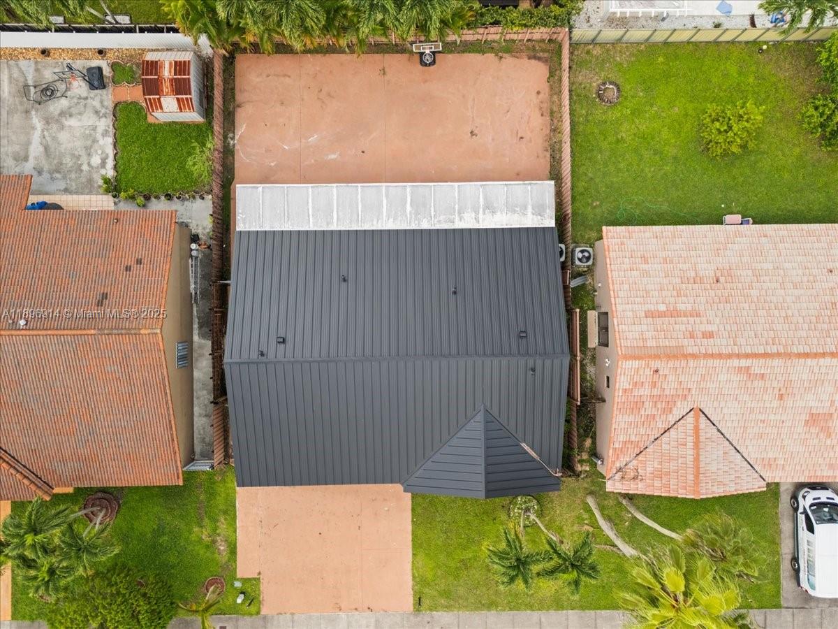 15327 Southwest 179th Terrace Miami, FL 33187 - Photo 28 of 29 view of house with yard