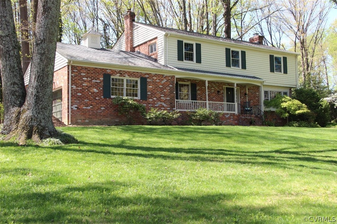 4312 Croatan Road Richmond, VA 23235 - Photo 1 of 26 a front view of a house with a yard