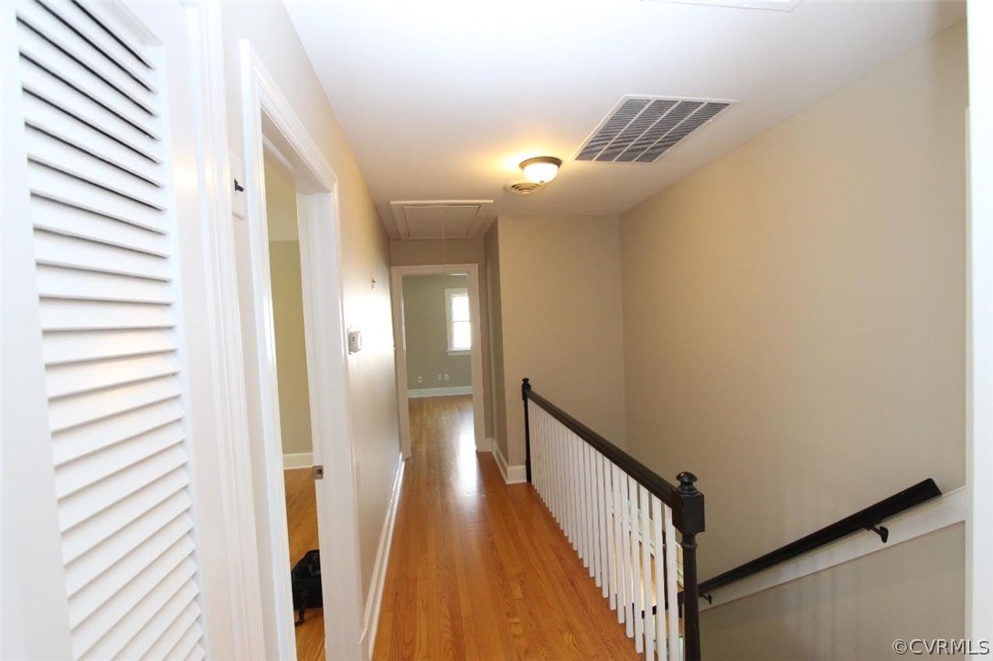 4312 Croatan Road Richmond, VA 23235 - Photo 22 of 26 a view of a hallway with wooden floor