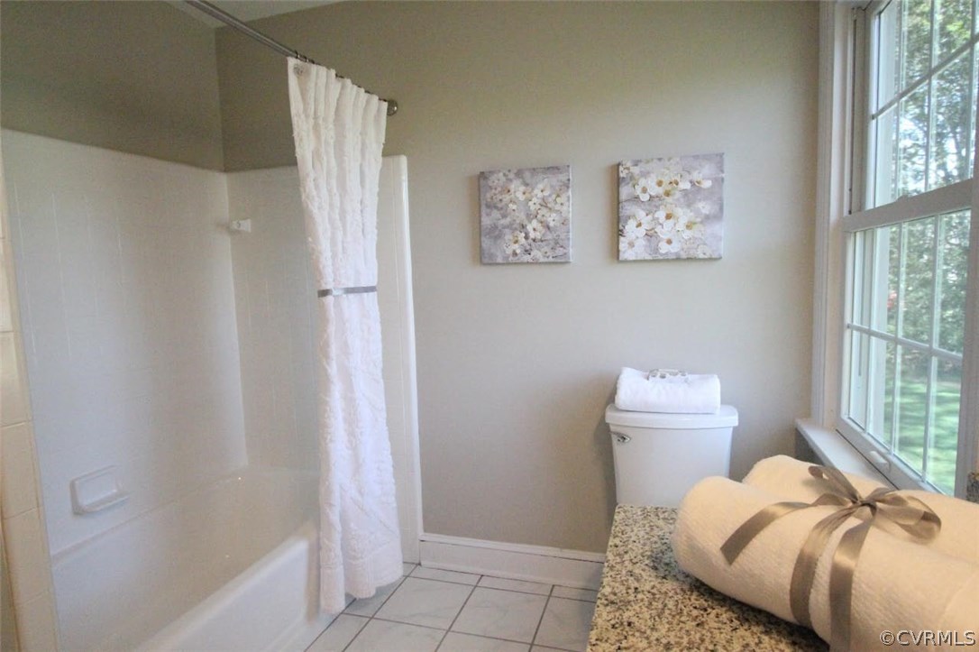 4312 Croatan Road Richmond, VA 23235 - Photo 10 of 26 a bedroom with a bed and a window