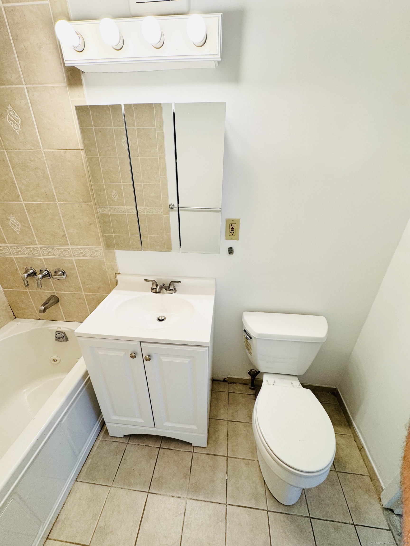 107 Niles Hill Road, Unit A New London, CT 06320 - Photo 11 of 22 a bathroom with a sink toilet and mirror