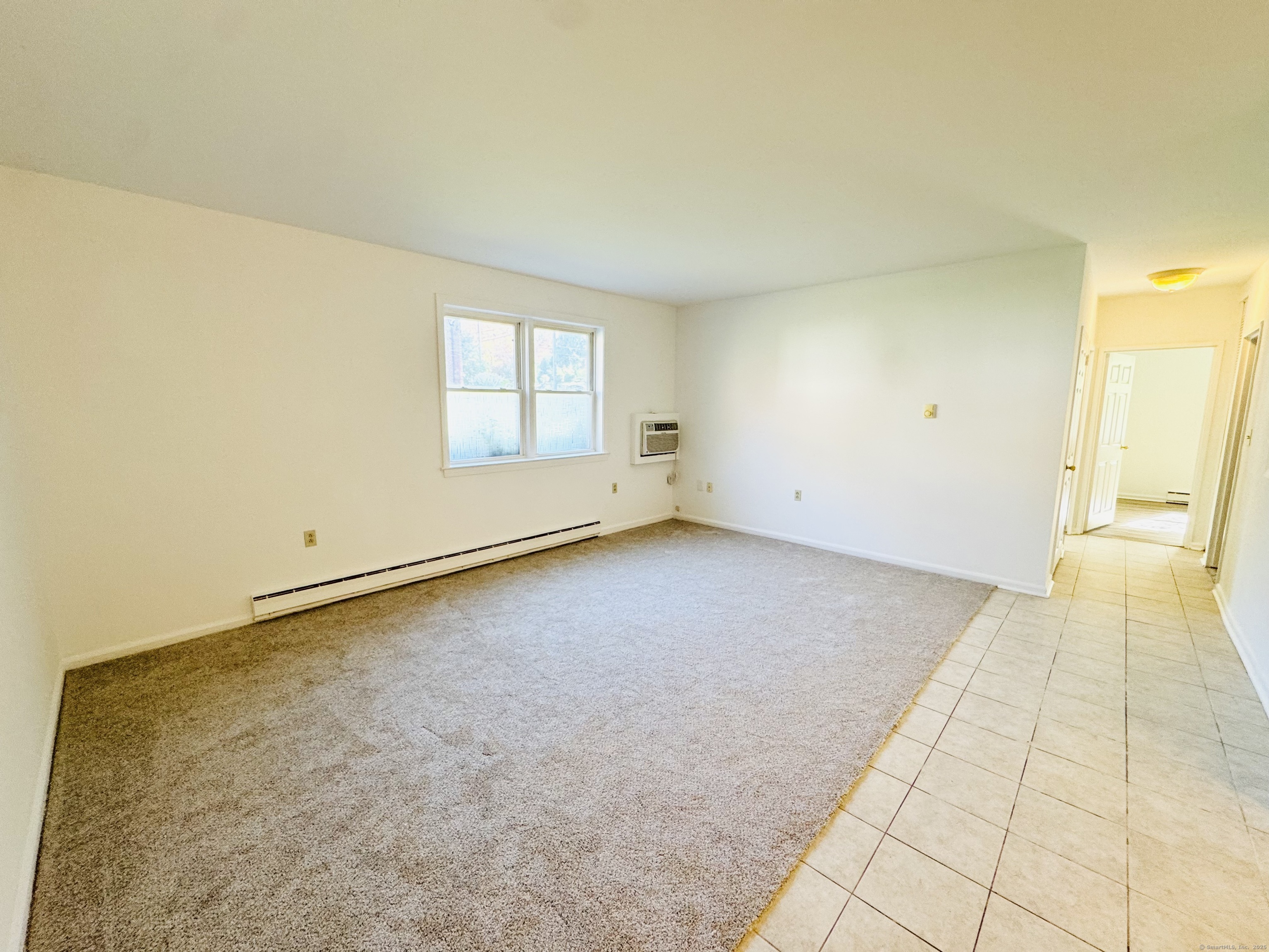 107 Niles Hill Road, Unit A New London, CT 06320 - Photo 3 of 22 an empty room with a window