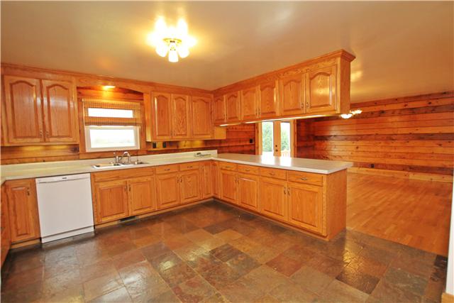 3471 Gunn Road Springfield, TN 37172 - Photo 3 of 20 H-U-G-E dining room with hardwood floors and great views of the manicured acreage.