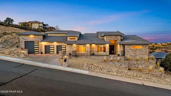 a view of a street with a building in the background